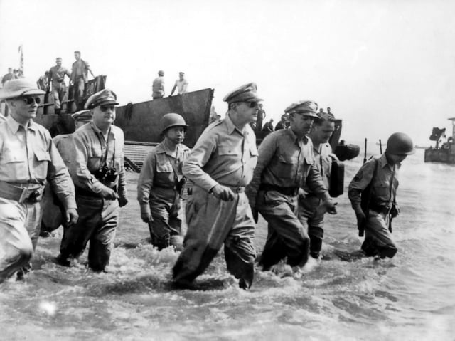 General Douglas MacArthur wading ashore at Leyte