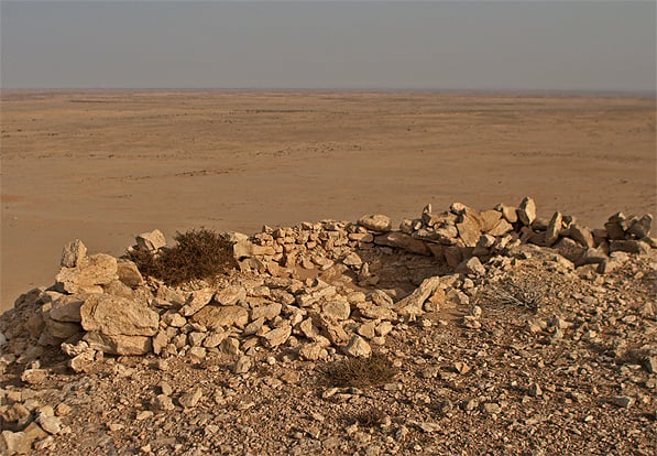 A sangar (fortification) from the Western Sahara conflict. The fortification is built of rocks on top of a mesa overlooking the Grart Chwchia, Al Gada, Western Sahara. The Sangar is facing north and was probably built by the Sahrawis in the 1980s.