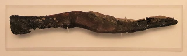 A very early sickle, c. 7000 BC, flint and resin, Tahunian culture, Nahal Hemar cave, now in the Israel Museum.