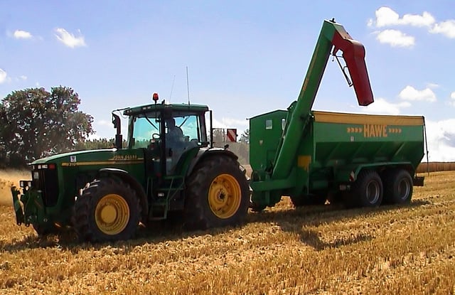 Agriculture production, pictured is a tractor and a chaser bin