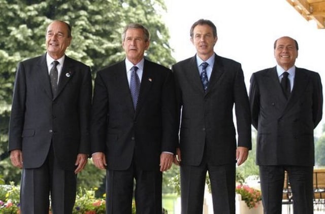 From left: French President Jacques Chirac, US President George W. Bush, British Prime Minister Tony Blair and Italian Prime minister Silvio Berlusconi at the G8 Summit at Evian, France. Chirac was against the invasion, the other three leaders were in favor of it.