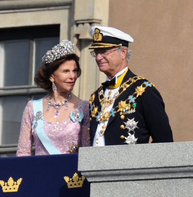 King Carl XVI Gustaf with Queen Silvia at the royal wedding of their daughter Victoria