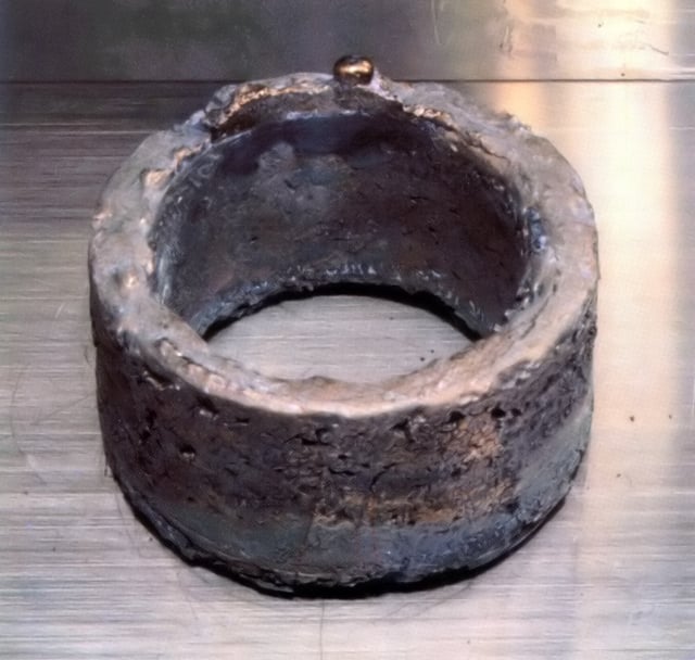 A ring of weapons-grade 99.96% pure electrorefined plutonium, enough for one bomb core. The ring weighs 5.3 kg, is ca. 11 cm in diameter and its shape helps with criticality safety.