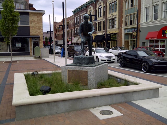 Statue of Abraham Lincoln in downtown Decatur on the site of his first political speech. The plaque reads "Abraham Lincoln's first political speech: Lincoln mounted a stump by Harrell's Tavern facing this square and defended the Illinois Whig party candidates near this spot at age 21 in the summer of 1830"