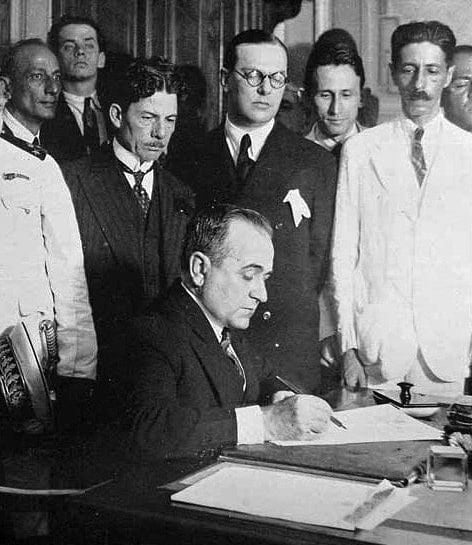 Vargas with members of his cabinet on inauguration day, 3 November 1930. The man with glasses (center) is Lindolfo Collor, maternal grandfather of Fernando Collor de Mello, the future President of Brazil.