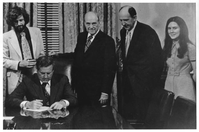Governor A. Linwood Holton signs H‑210 separating George Mason College from the University of Virginia, April 7, 1972