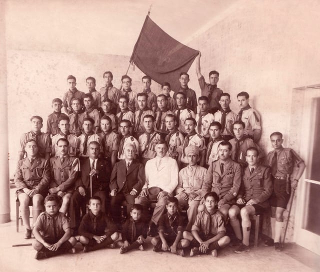 Haifa Maronite Boy Scouts, 1939. Center: Dr John Macqueen Chief Medical Officer for Haifa