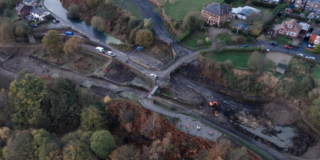 An aerial view of Nob End locks showing the first Bolton bridge dug out and a dam being built across the Bury arm.
