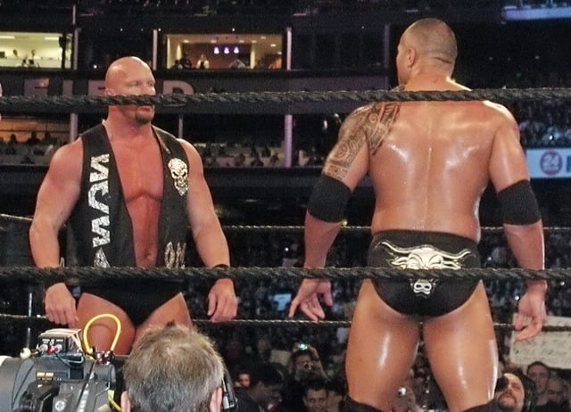 The Rock defeated Stone Cold Steve Austin (left) in the latter's final match at WrestleMania XIX in March 2003