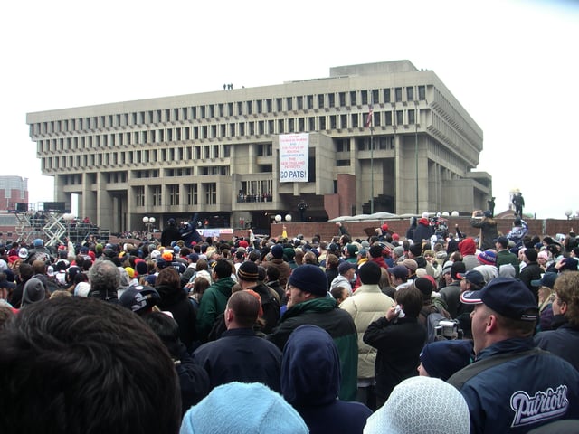 Patriot fans rally in front of Boston City Hall following the Super Bowl XXXVIII championship