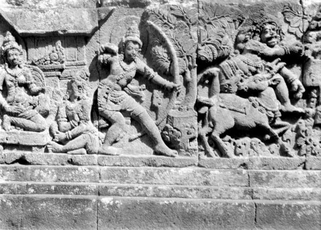 Relief with part of the Ramayana epic, shows Rama killed the golden deer that turn out to be the demon Maricha in disguise. Prambanan Trimurti temple near Yogyakarta, Java, Indonesia.