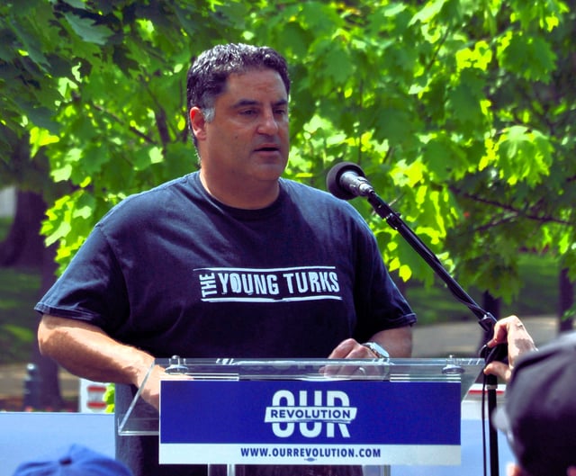Uygur speaking at the People's Climate March in Washington, D.C. in April 2017