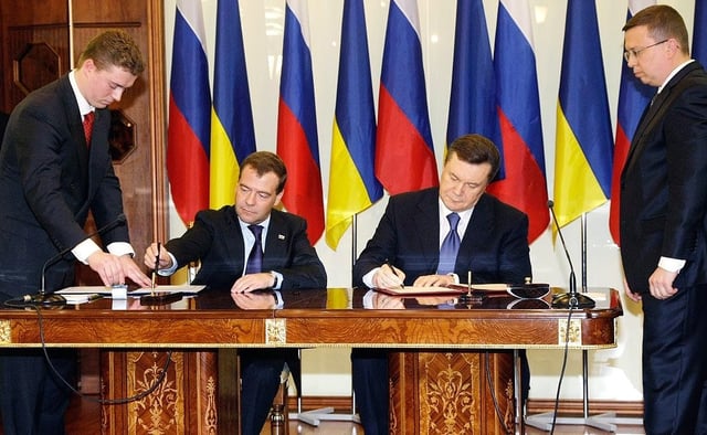 Signing documents with President Dmitry Medvedev