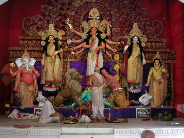 Bengali Hindu priests performing Durga Puja rituals