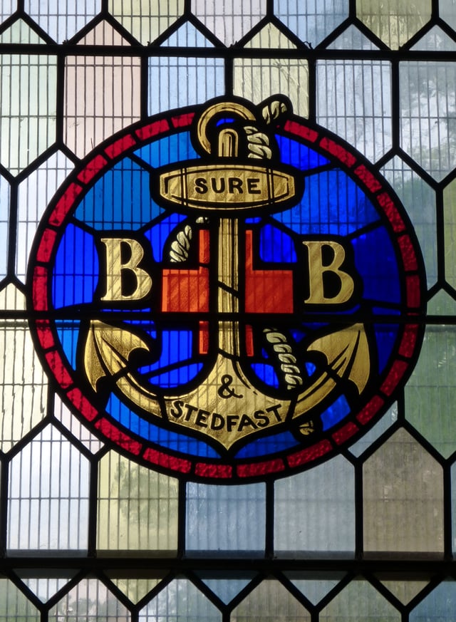The Boys' Brigade emblem on a stained glass window in a parish church