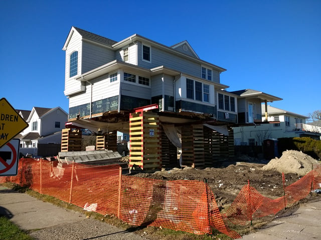 In Long Beach, New York, five years after the storm, homes are still being raised—lifted on temporary pilings so that permanent foundations could be put in.