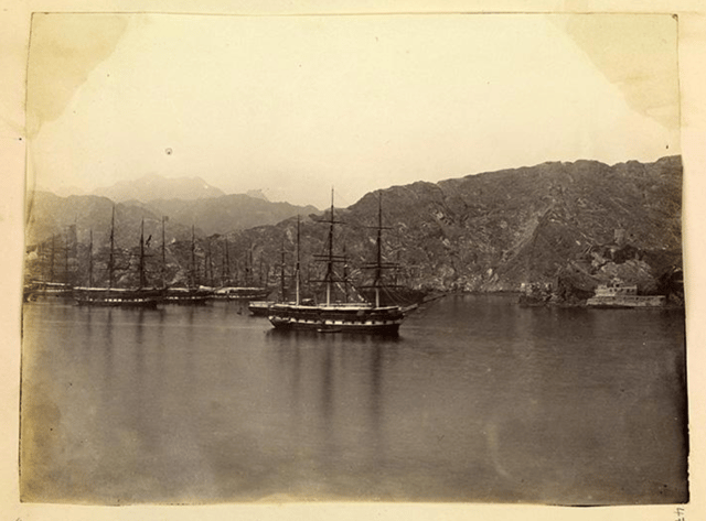 A cove at Muscat showing a British naval squadron.