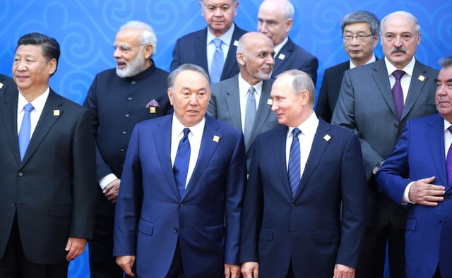 Nazarbayev and Russian President Vladimir Putin during the 2017 SCO Council of Heads of State meeting in Nur-Sultan.