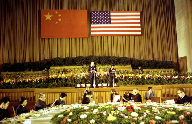 Ford makes remarks at a Reciprocal Dinner in Beijing on December 4, 1975