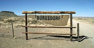 Welcoming sign of the Burgsdorf farm in Hardap