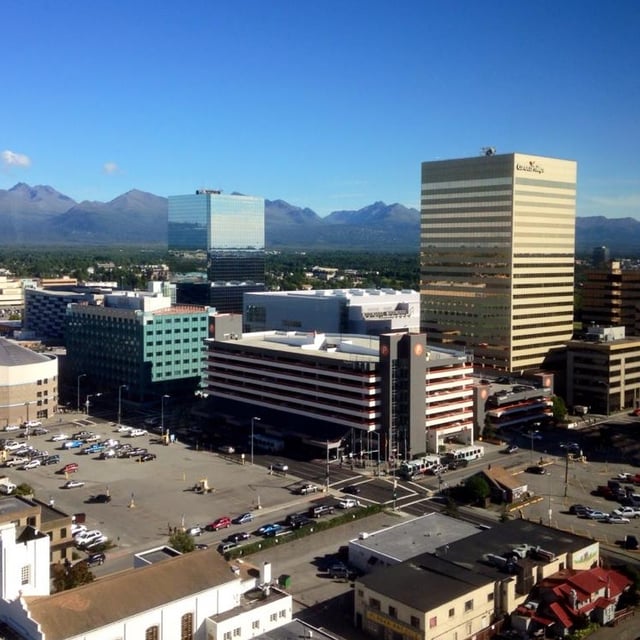 View of downtown Anchorage from the Hotel Captain Cook. The gold building on the right, the Conoco-Phillips Building, is the tallest building in Alaska and exemplifies the importance of the petroleum industry.