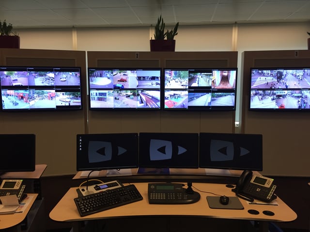 Desk in one of the regional control-rooms of the National Police in the Netherlands in 2017.