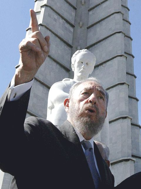Castro in front of a Havana statue of Cuban national hero José Martí in 2003