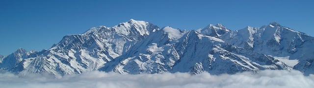 Mont Blanc, the highest summit in Western Europe, marks the border with Italy.