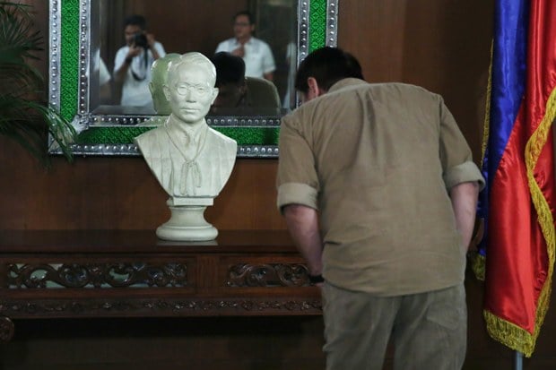 President Rodrigo Duterte looks at a bust sculpture of composer Nicanor Abelardo at the Music Room.