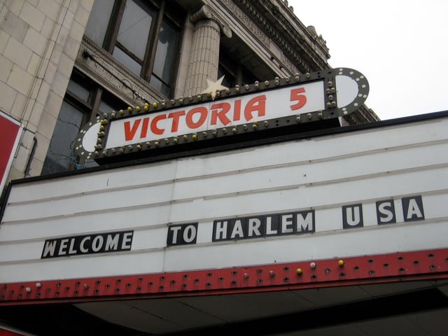 Welcome to Harlem sign above the now defunct Victoria 5 cinema theater on 125th st