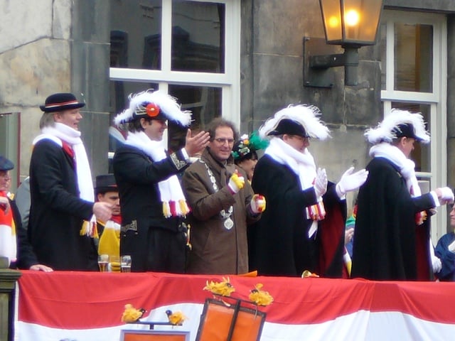 Mayor Ton Rombouts, Peer vaan den Muggenheuvel tot den Bobberd and Prince Amadeiro XXV on the steps of the City Hall in 's-Hertogenbosch during Carnival 2007
