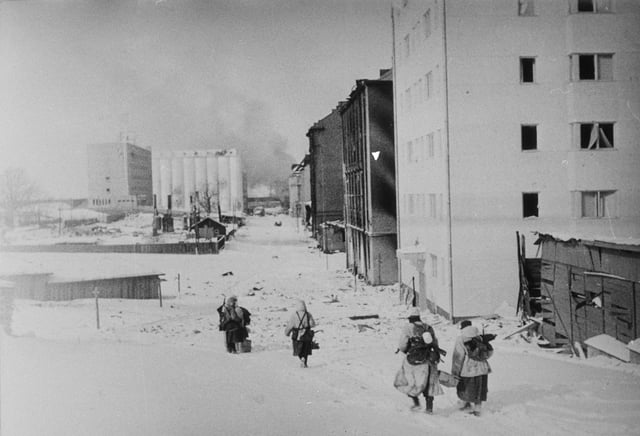 11:45 a.m. on 13 March 1940. Finnish soldiers retreating at Vyborg to the demarcation line.