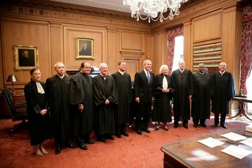 Justices of the Supreme Court with President George W. Bush (center), October 2005.