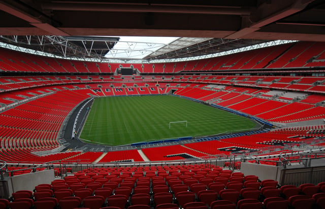 Wembley Stadium, home of the England football team, has a 90,000 capacity. It is the biggest stadium in the UK.