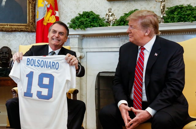 Brazilian President Jair Bolsonaro, sometimes called a "Tropical Trump", with U.S. President Donald Trump