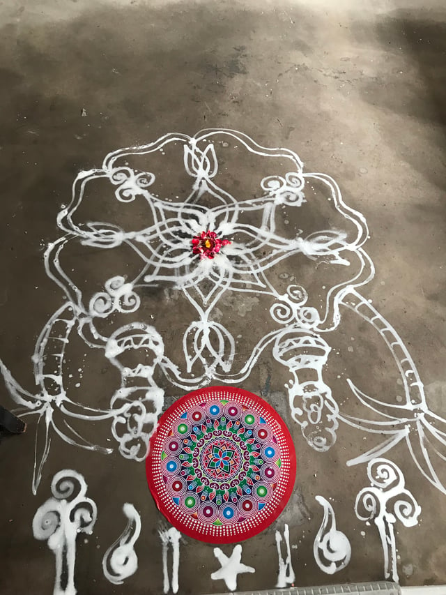 Traditional Agrahara kolam made with soaked rice flour for the festival of Thai Pongal,taken from a house in Singapore