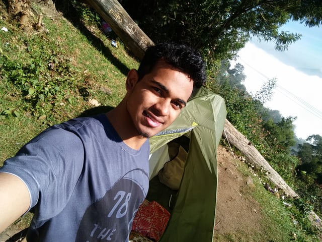 Diagonal selfie taken on a camping trip.