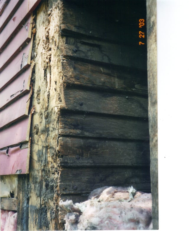 Very old, beaded oak clapboards on the right, modern clapboard siding on the left.