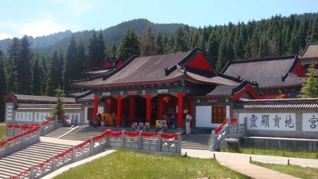 Temple of Fortune and Longevity, at the Heavenly Lake of Tianshan in Fukang, Changji, Xinjiang. It is an example of Taoist temple which hosts various chapels dedicated to popular gods.