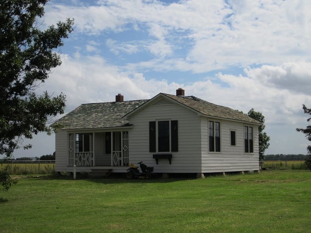 Cash's boyhood home in Dyess, Arkansas, where he lived from the age of three in 1935 until he finished high school in 1950. The property, pictured here in 2013, is listed on the National Register of Historic Places.
