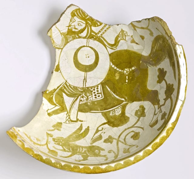 Fragment of a bowl depicting a mounted warrior, 11th century.