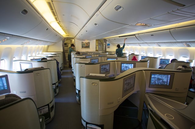 Business class in a 1-2-1 reverse herringbone layout on an EVA Air 777-300ER