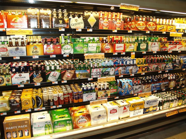 Whole Foods Market has opened wine and beer shops to cater to their upmarket brand. Above, the imported beer case at a Whole Foods beer shop.