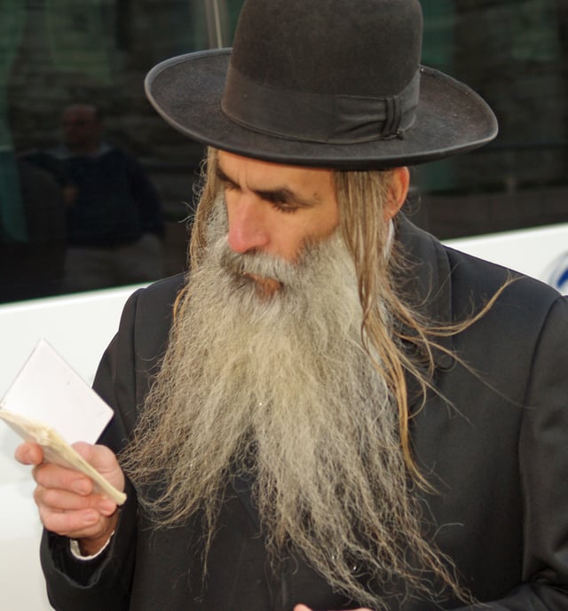 Orthodox Jew in Jerusalem with an unshaved beard and peyos (sidelocks)