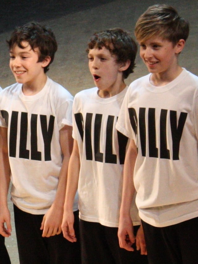 Holland (centre) performing at the fifth anniversary of Billy Elliot the Musical