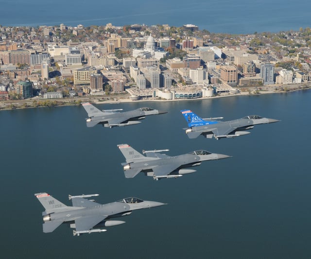 Wisconsin ANG F-16s over Madison, Wisconsin. The tail of the formation's lead ship features a special 60th Anniversary scheme for the 115th Fighter Wing.