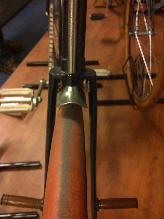 Spoon brake on antique Peugeot 'open diamond' frame 'Le Lion model B' at the Batavus Museum in Heerenveen, Netherlands