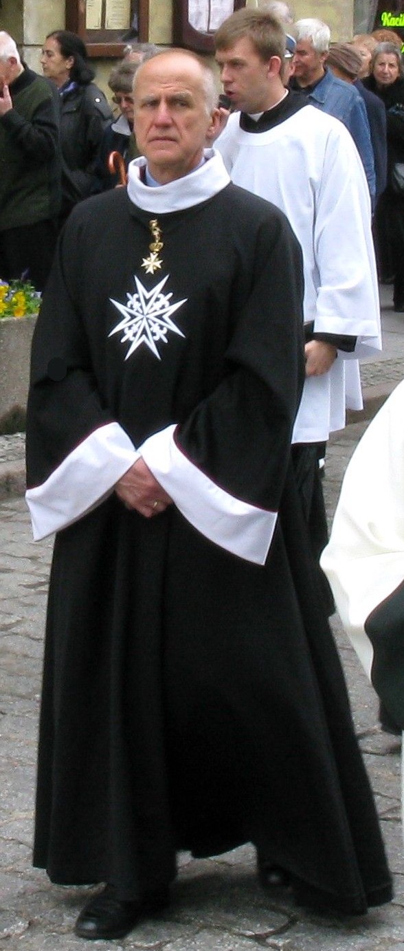 A Knight of Grace and Devotion in contemporary church robes