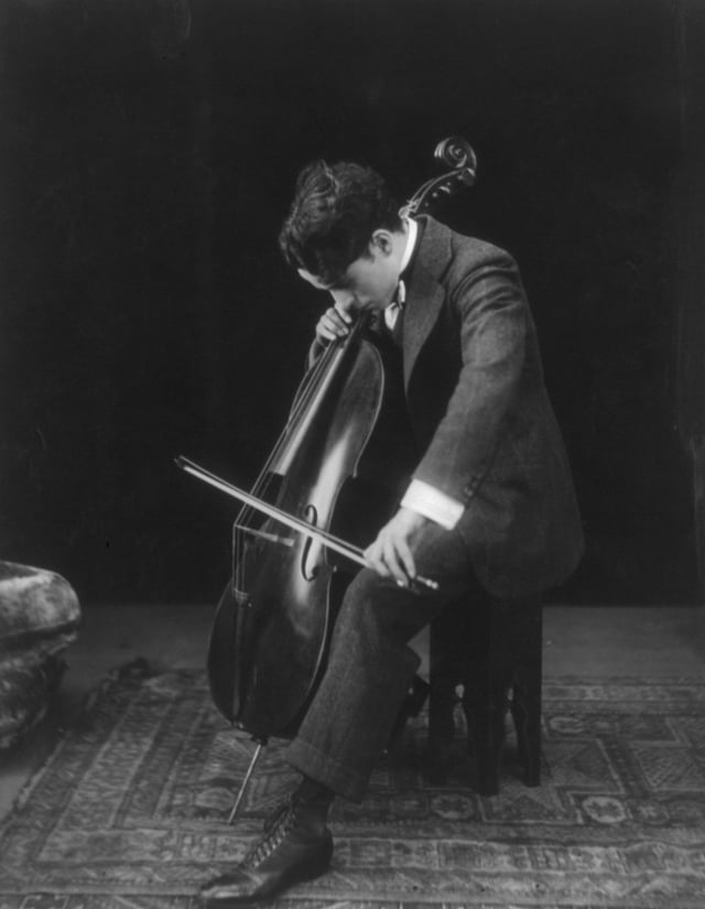 Chaplin playing the cello in 1915