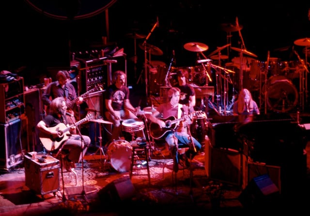 An acoustic performance at the Warfield Theatre in San Francisco in 1980. Left to right: Garcia, Lesh, Kreutzmann, Weir, Hart, Mydland.
